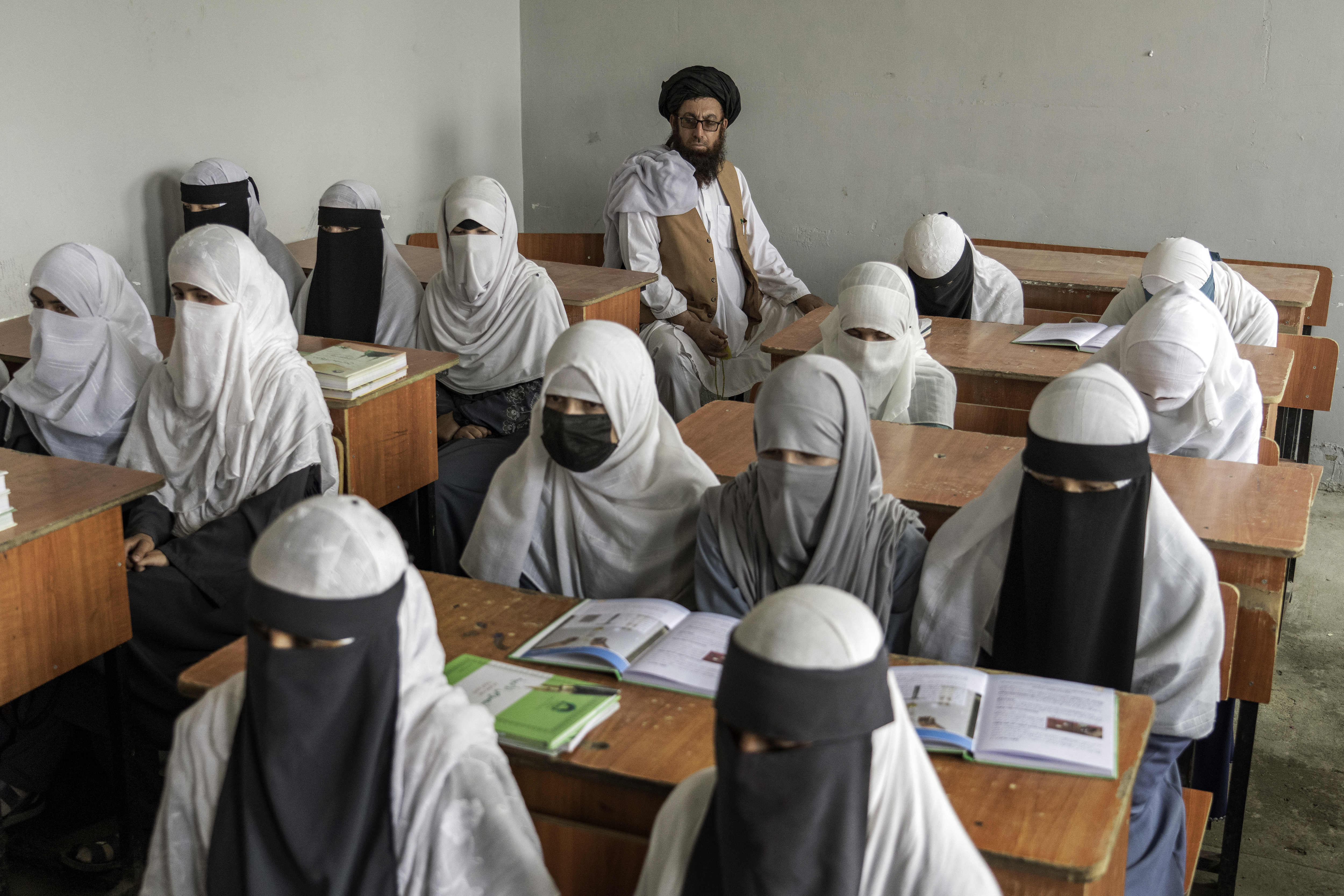 Afghan schoolgirls are finishing sixth grade in tears. Under Taliban rule,  their education is over | AP News