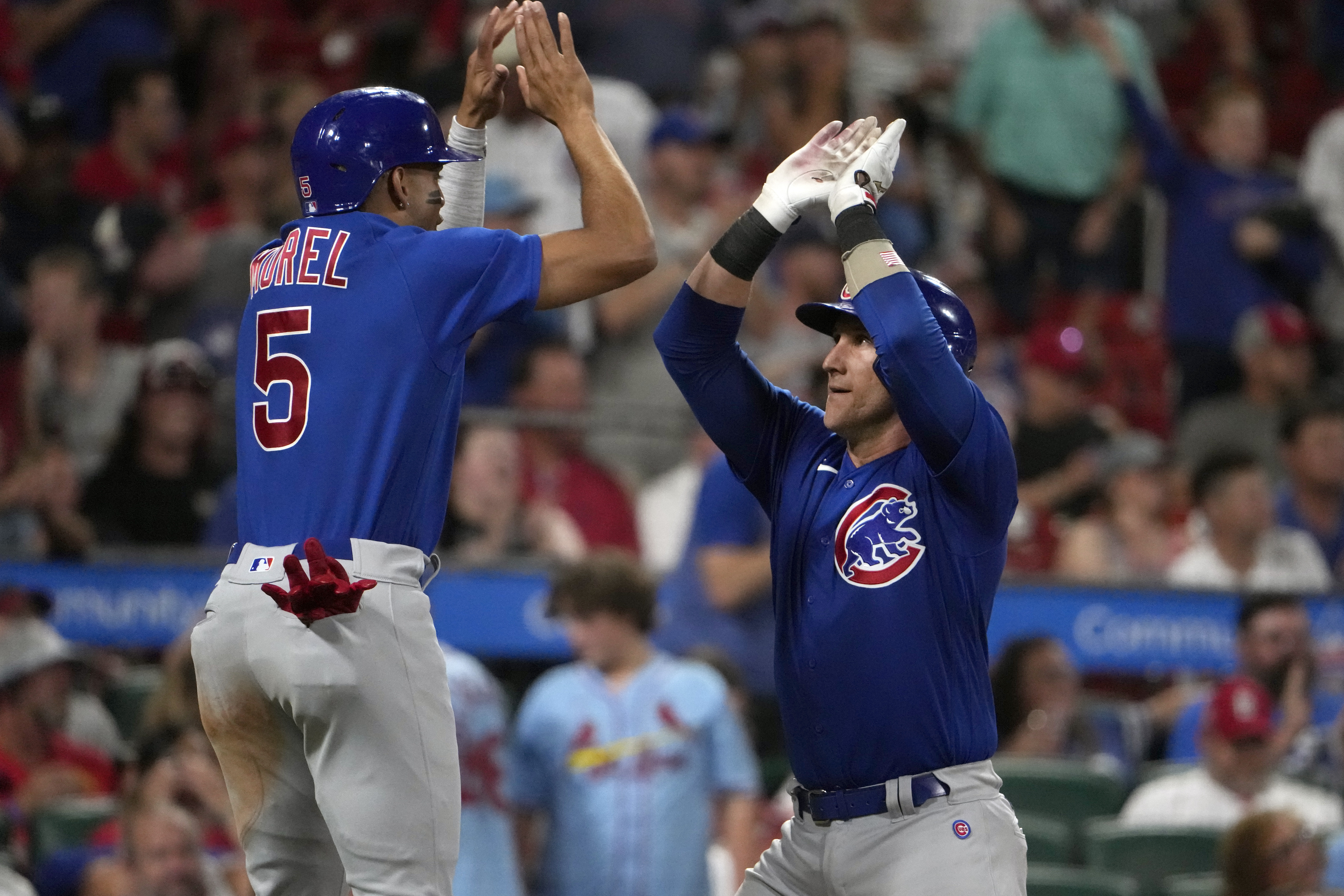 Happ homers twice, Steele pitches Cubs over Cardinals 9-1 in MLB's