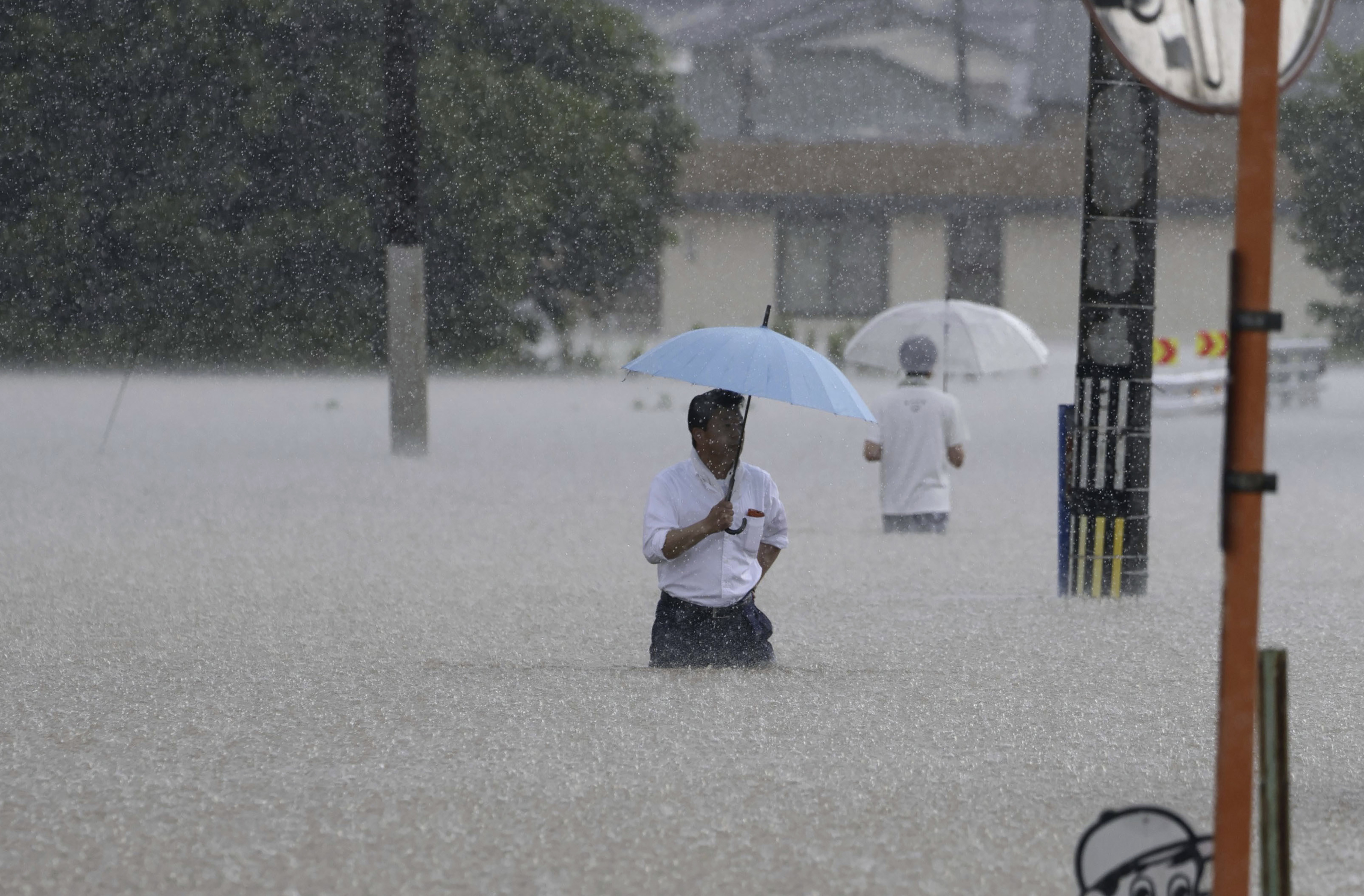 Deadly flooding is hitting several countries at once. Scientists say this  will only be more common | AP News