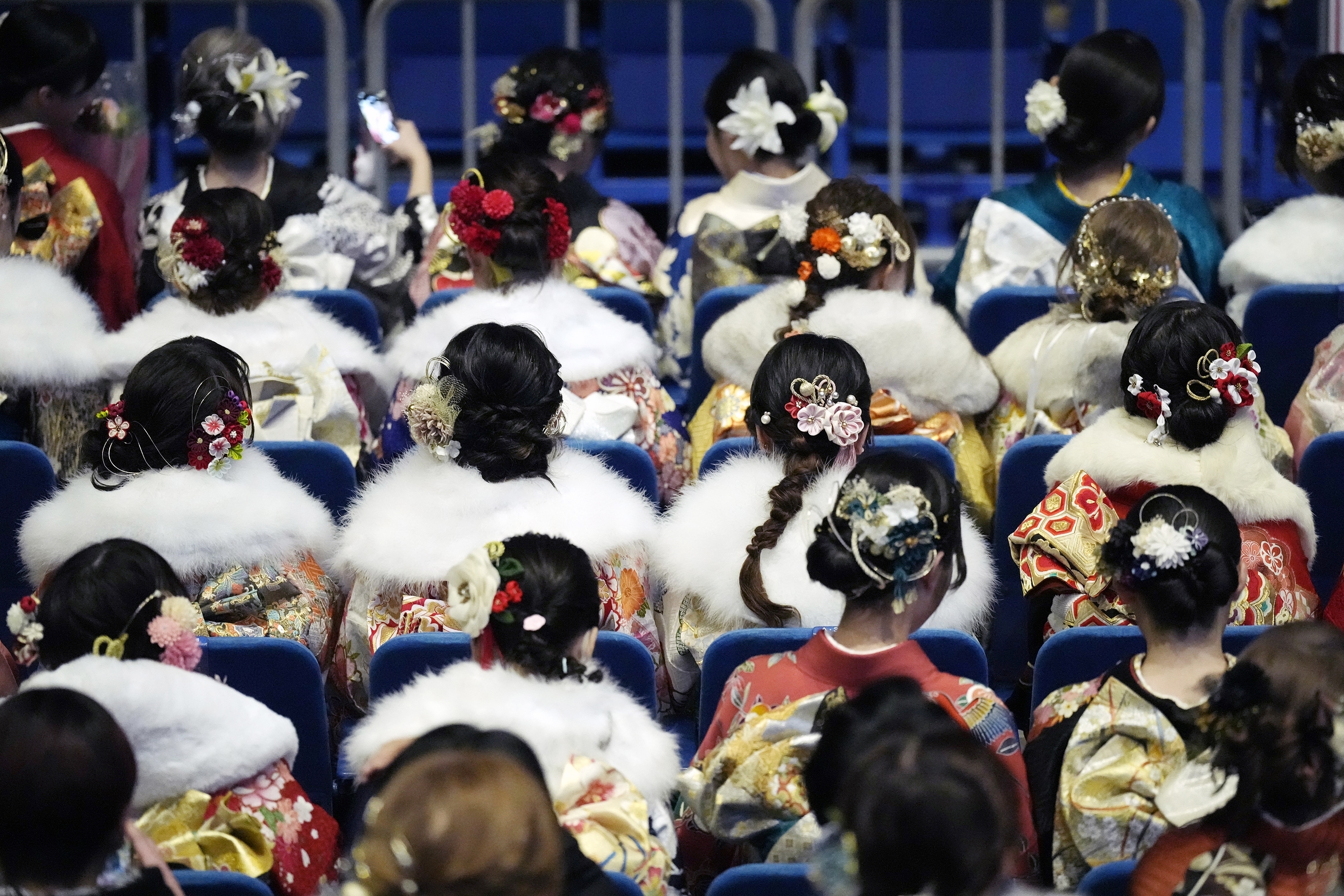 Kimono-clad women celebrating Coming-of-Age Day ⁢in Yokohama