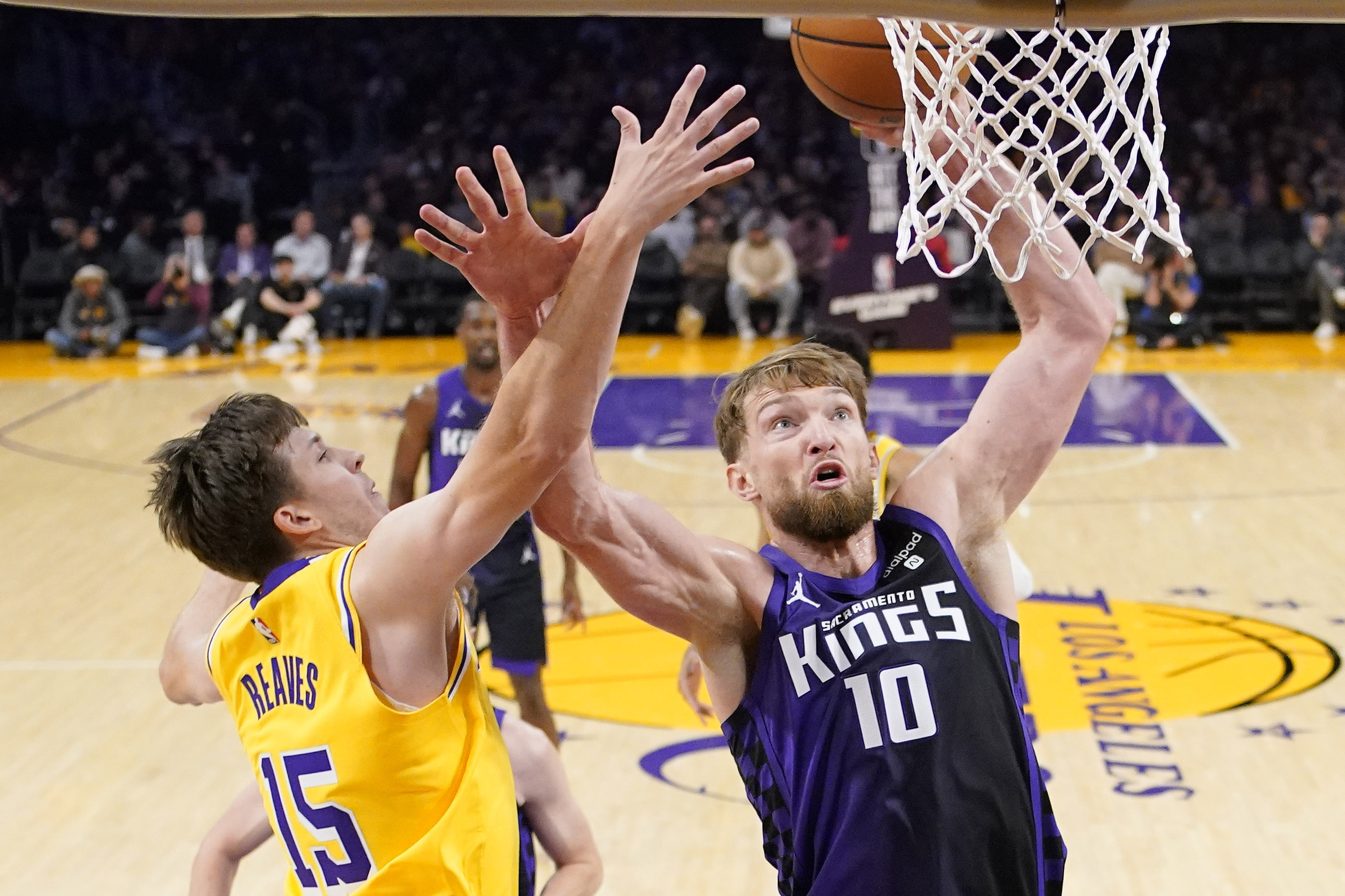 Kings overcome LeBron's triple-double, hold on in 4th quarter for 125-110  win over Lakers