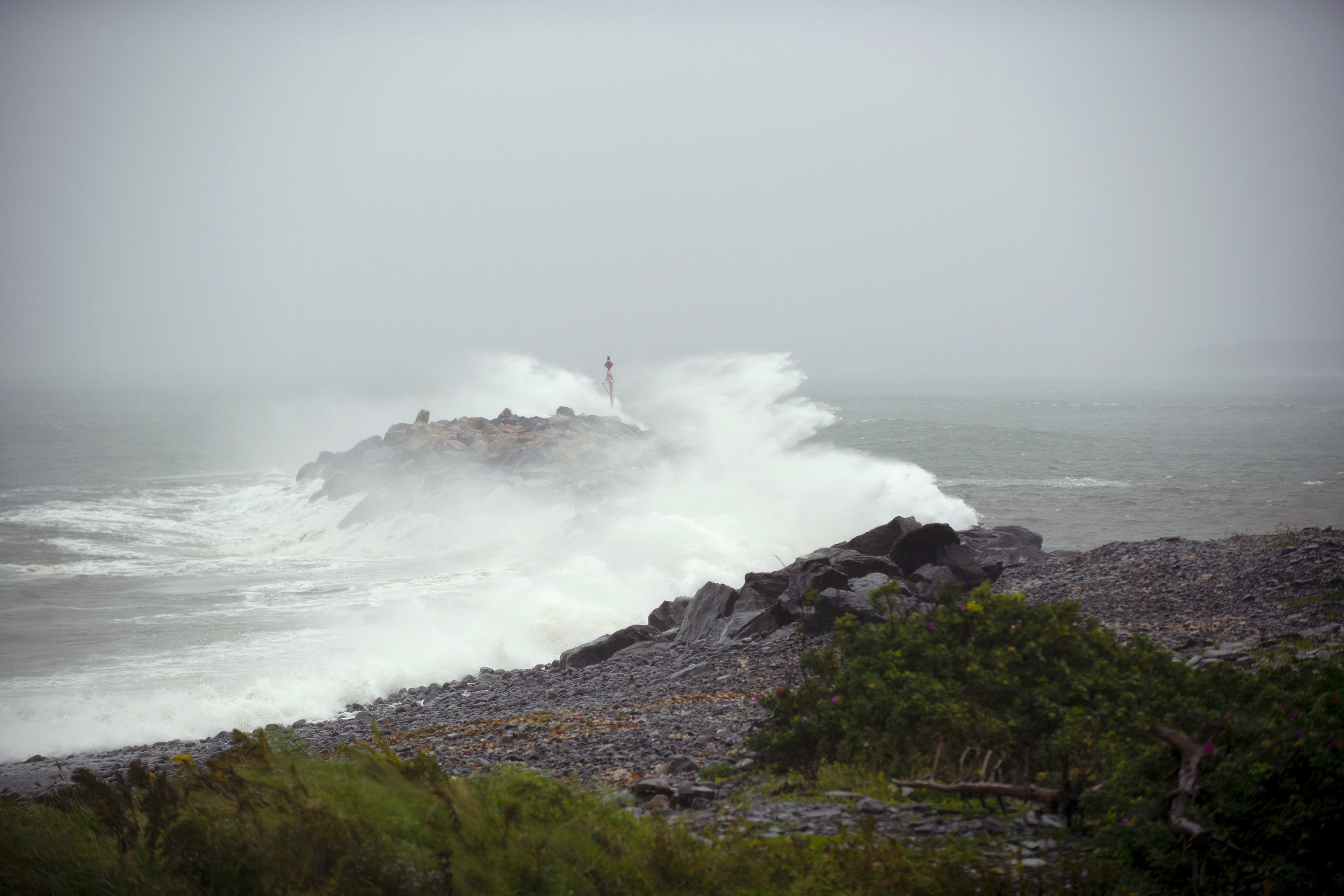 Thousands without power and 1 dead after Atlantic storm Lee