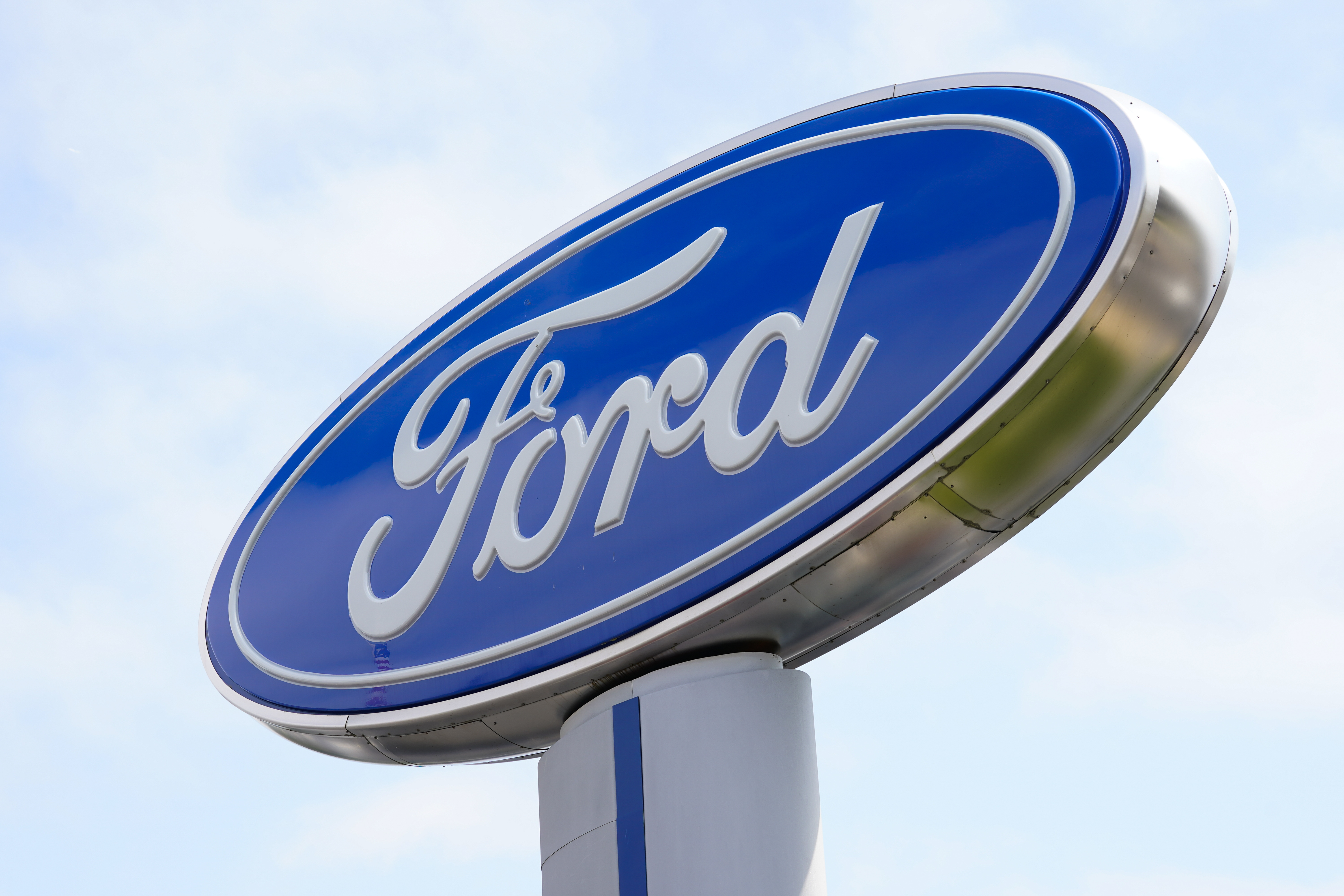Ford Shares Fall on EV Warning, F-150 Recall