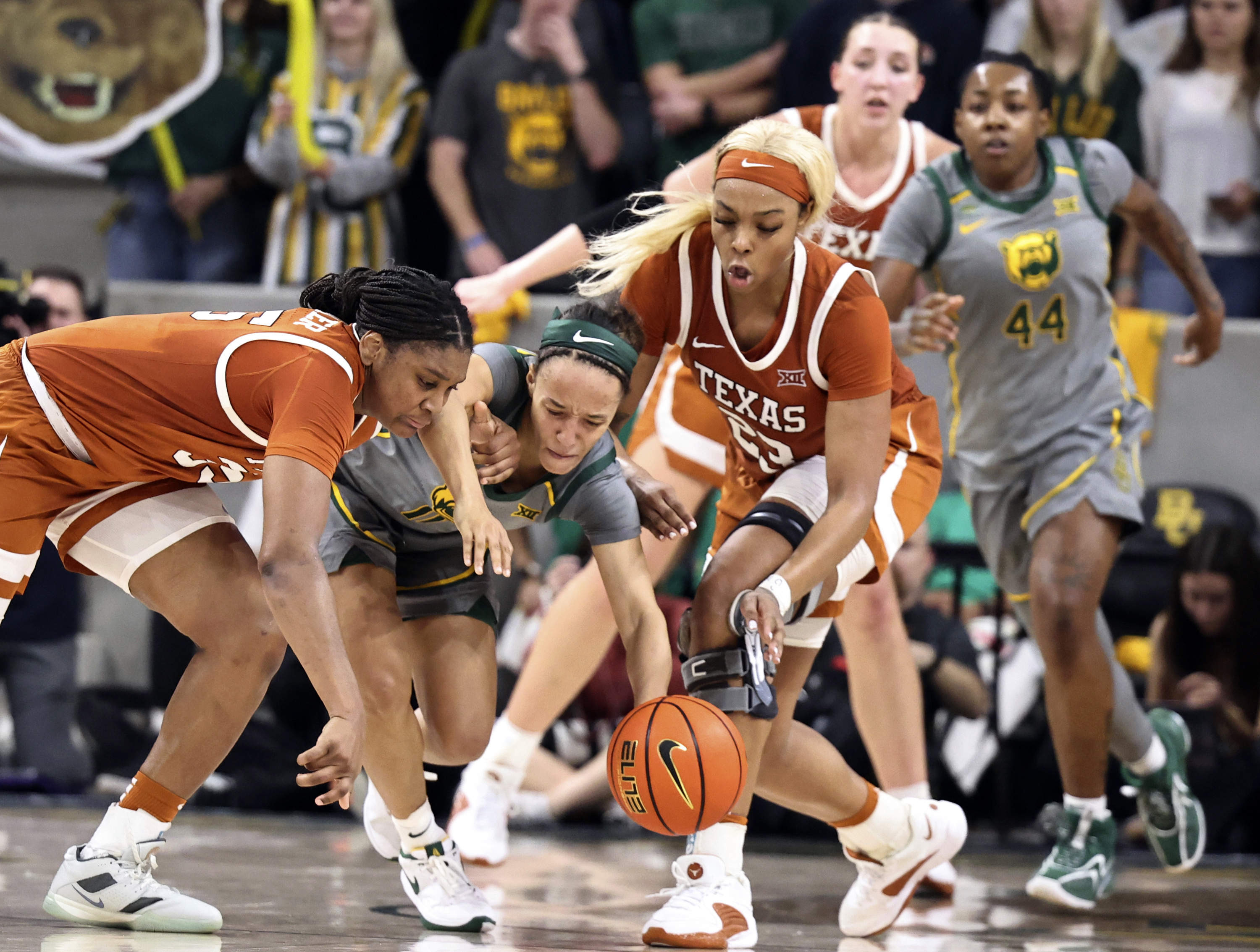 Madison Booker, Aaliyah Moore power No. 12 Texas women past No. 13 Baylor  67-55 | AP News