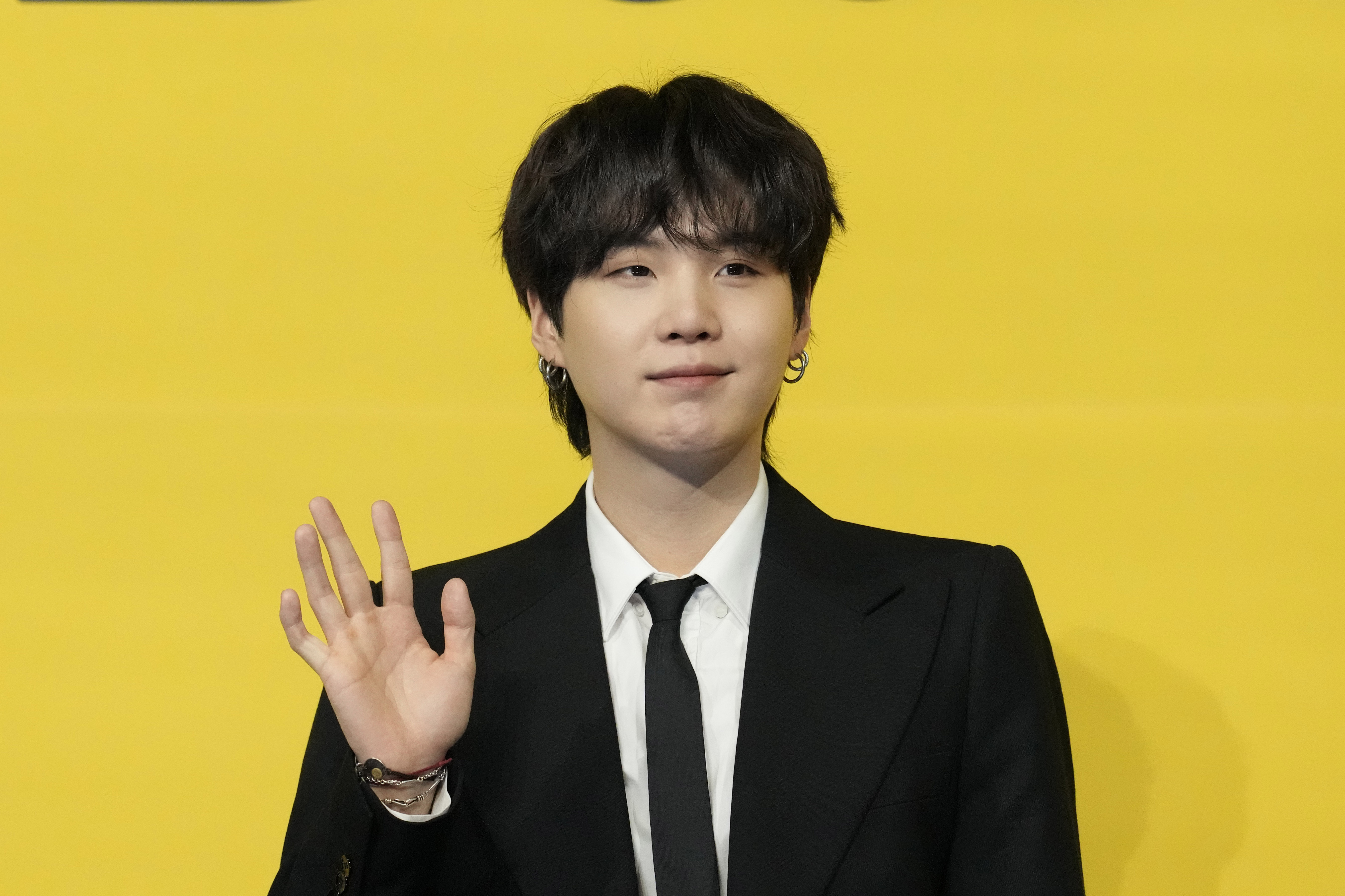 BTS' Suga starts military service this week, and his label is