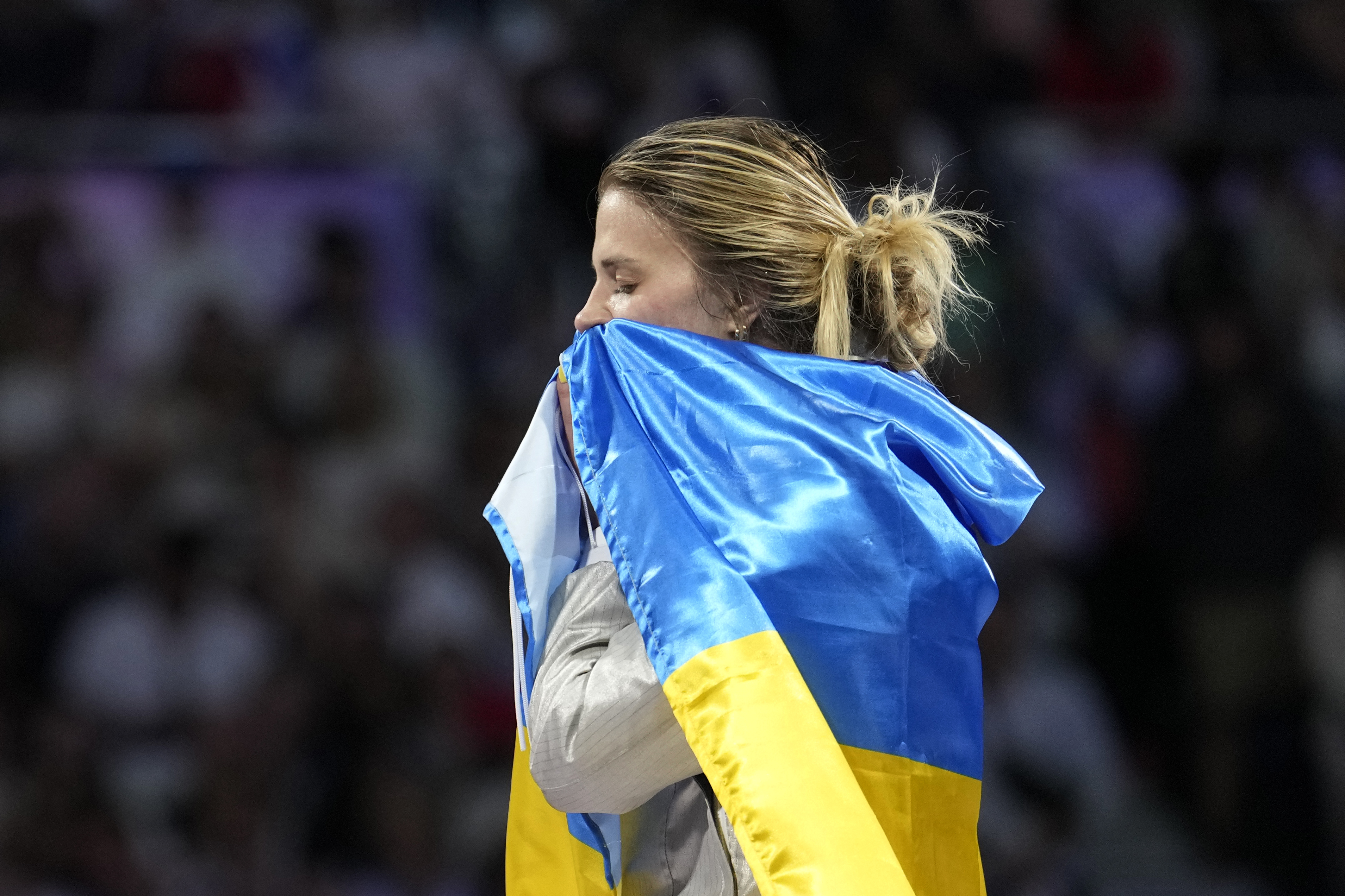 Ukraine wins its first gold medal of the Paris Olympics, in women's team saber fencing