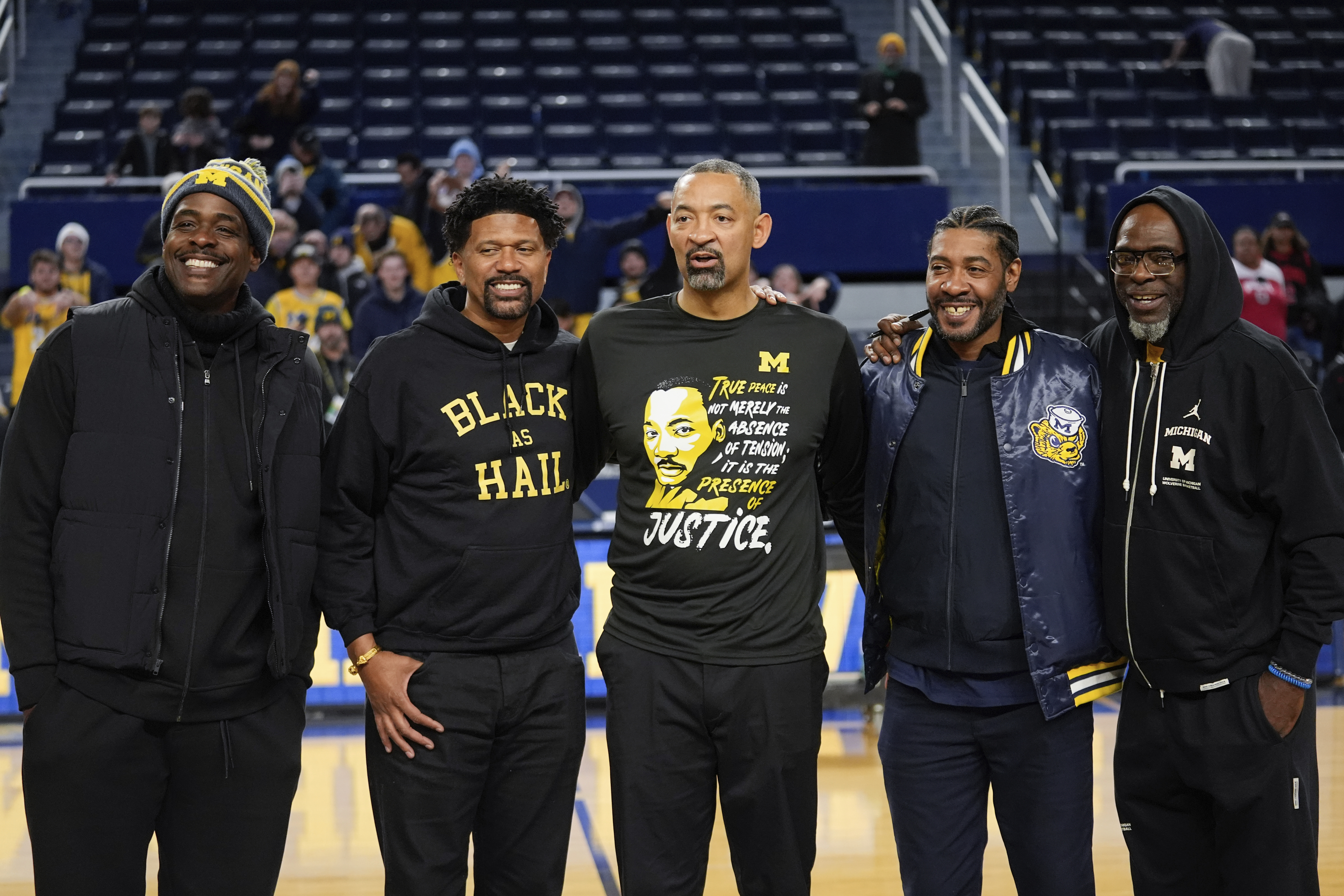 Michigan's Fab Five reunites to support Howard, attends 1st