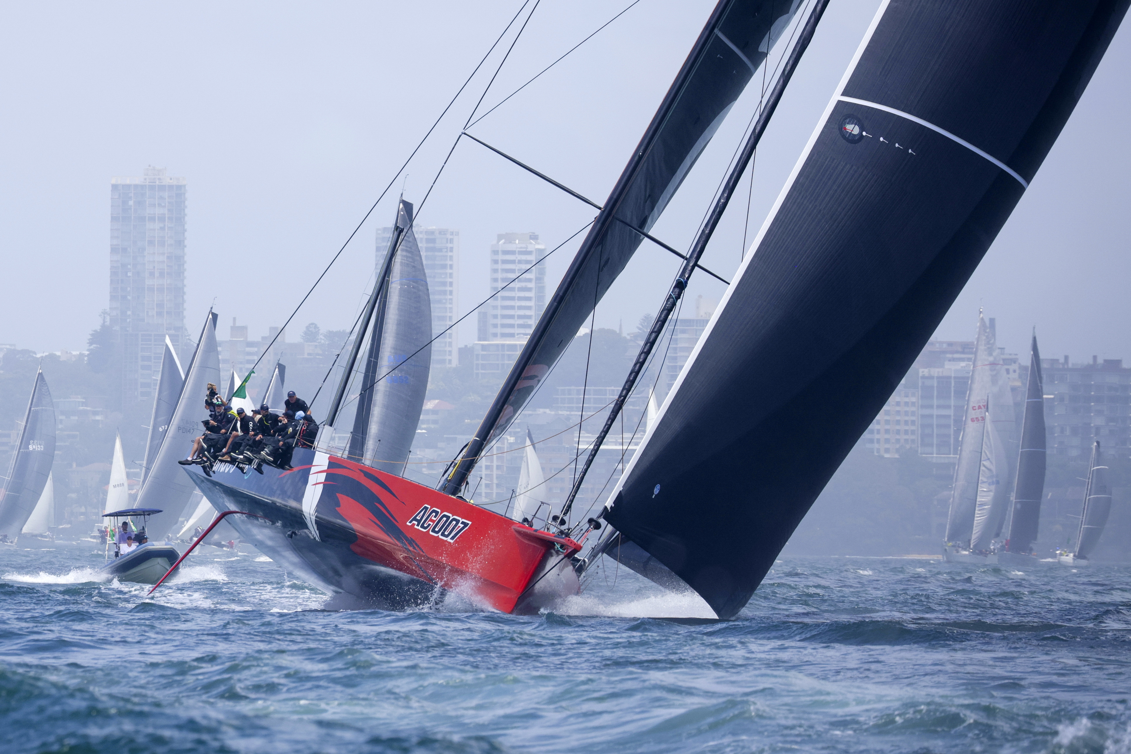 Two super maxis continue to lead the Sydney to Hobart race as storms hit  fleet | AP News