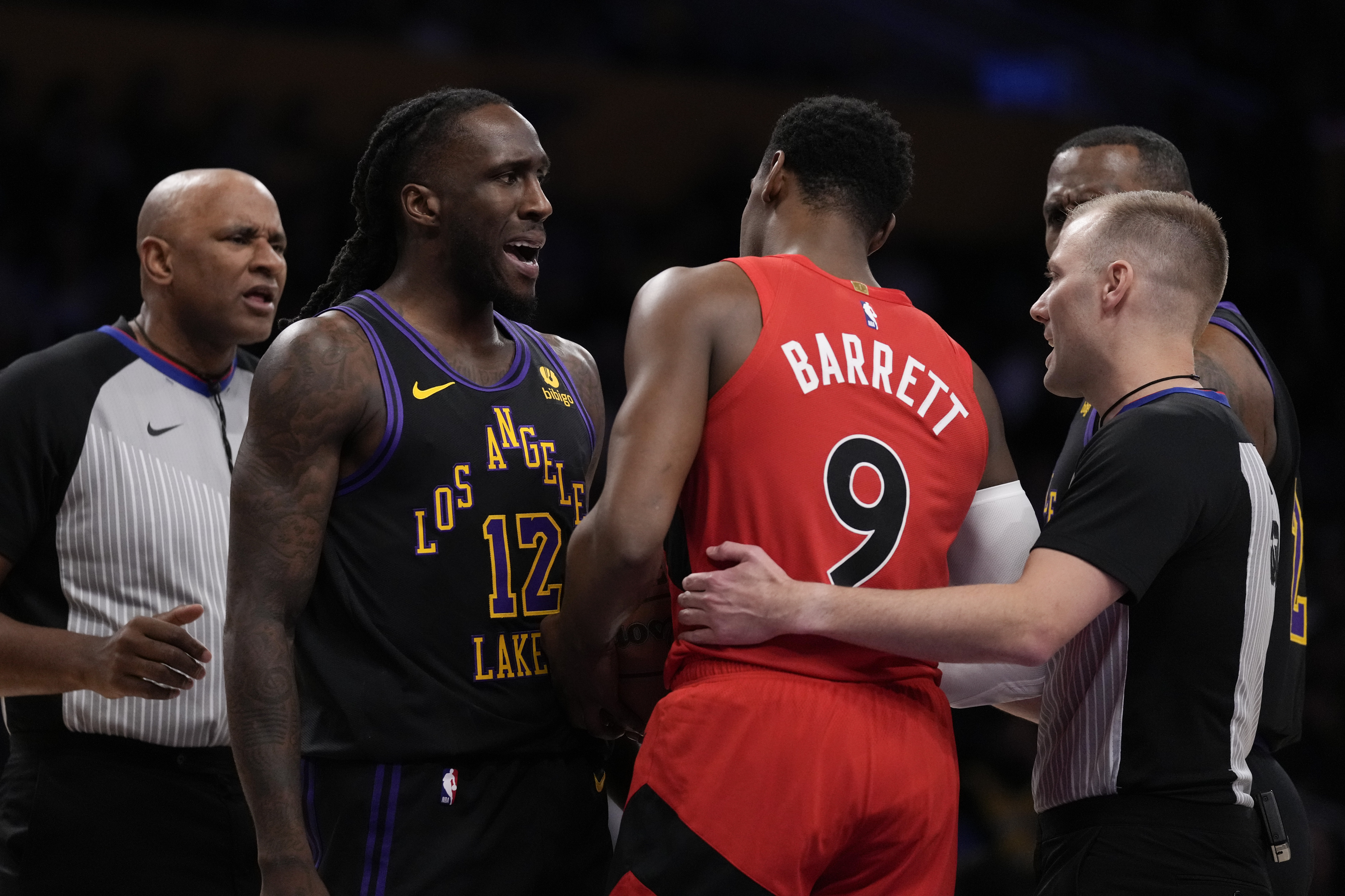 Toronto coach pounds table, rips officials after Lakers hold off