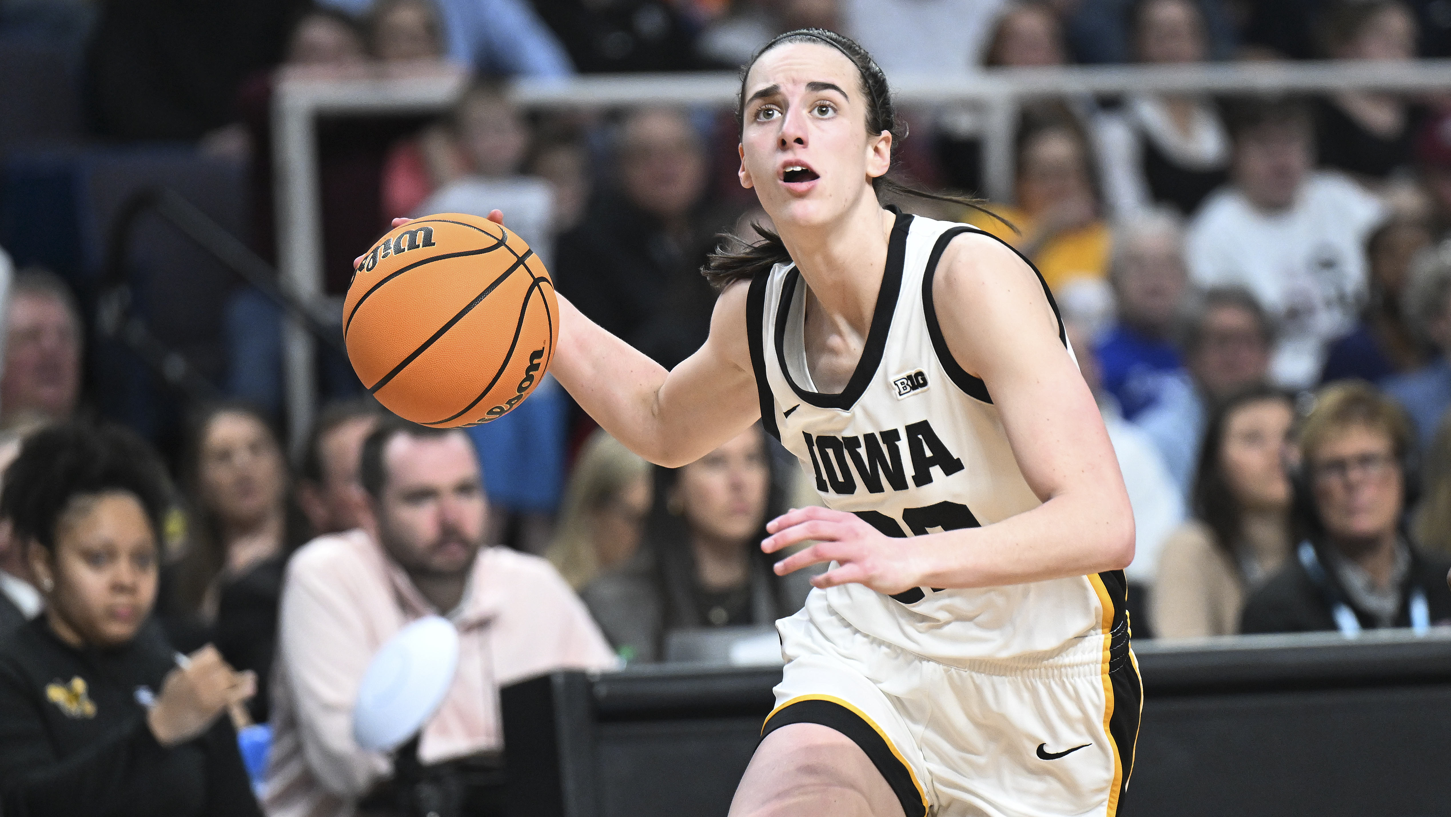 Caitlin Clark and Angel Reese are headed to the WNBA. Are they also  destined for a pay cut? | AP News