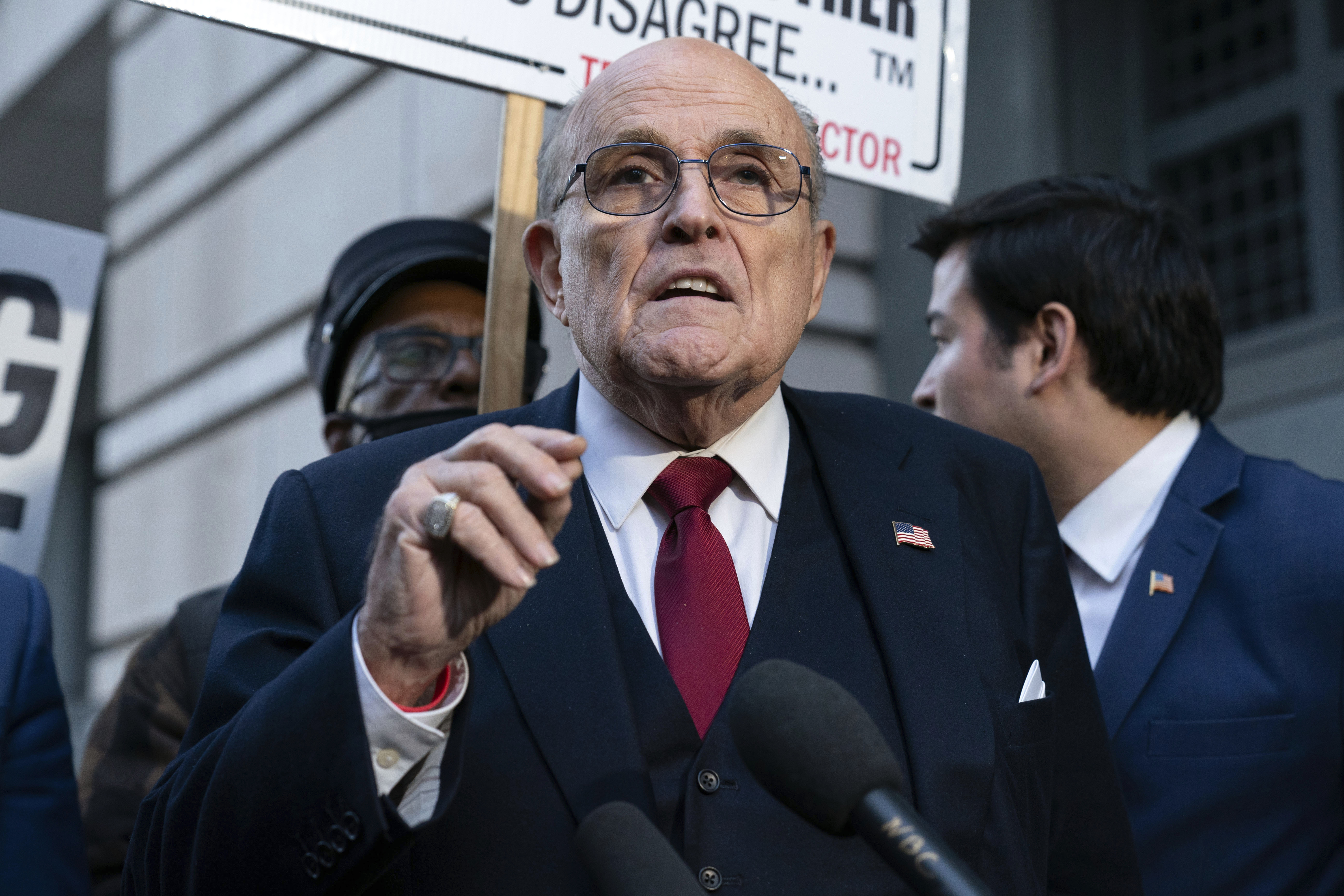 Woman sues Rudy Giuliani, saying he coerced her into sex, owes her $2  million in unpaid wages | AP News