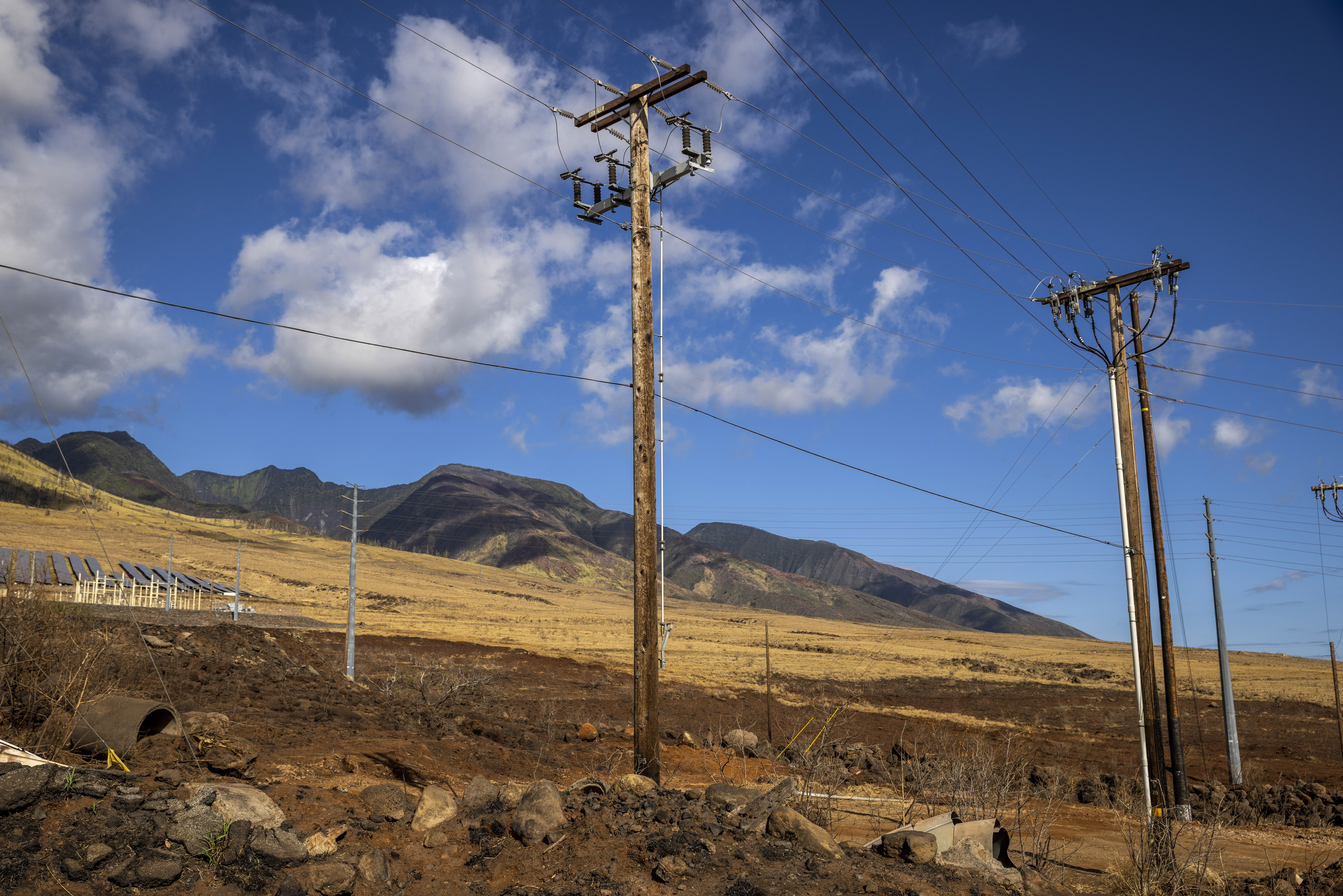 Bare electrical wire and leaning poles on Maui were possible cause