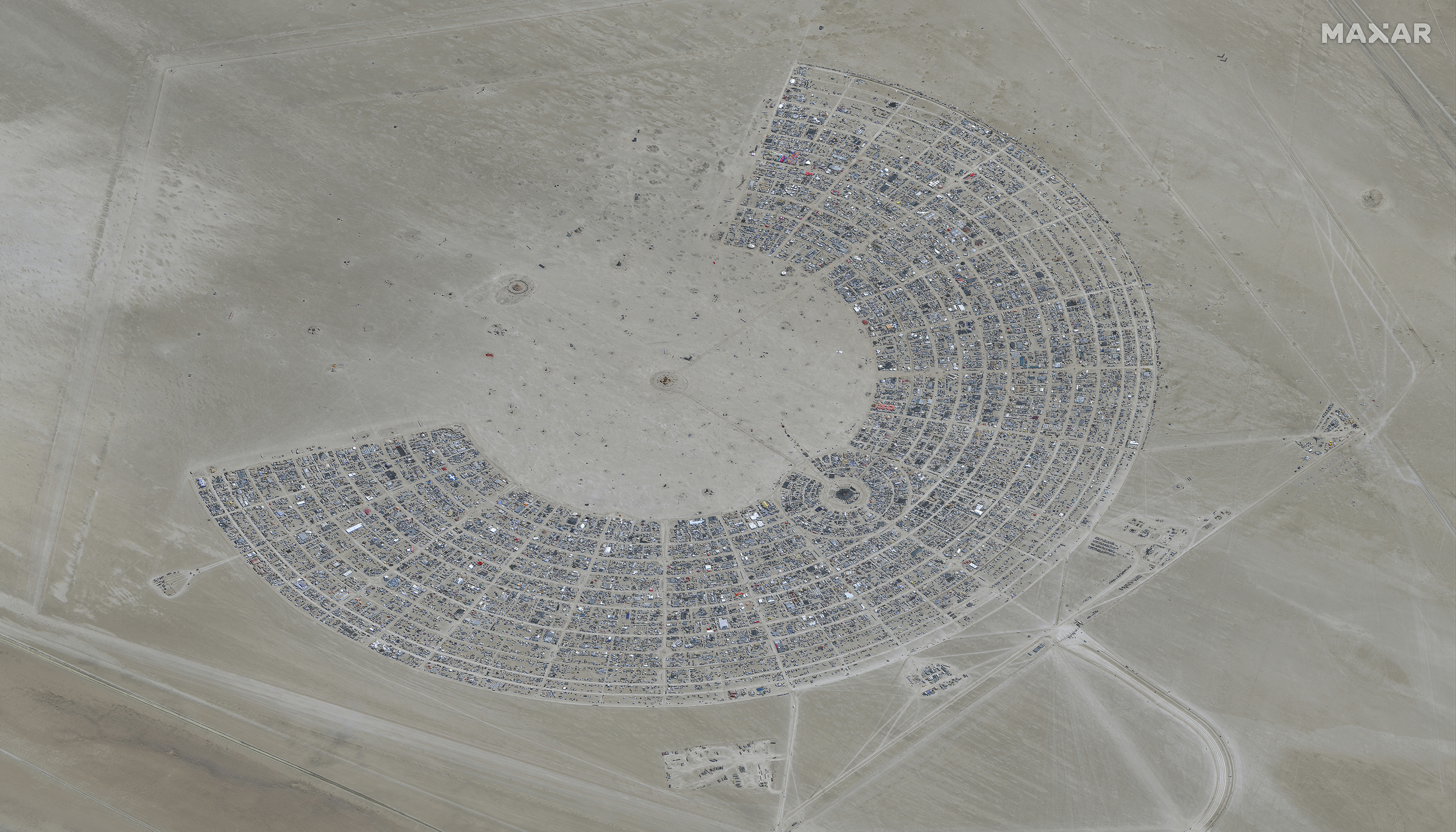 Burning Man flooding strands tens of thousands at Nevada site; authorities  are investigating 1 death | AP News