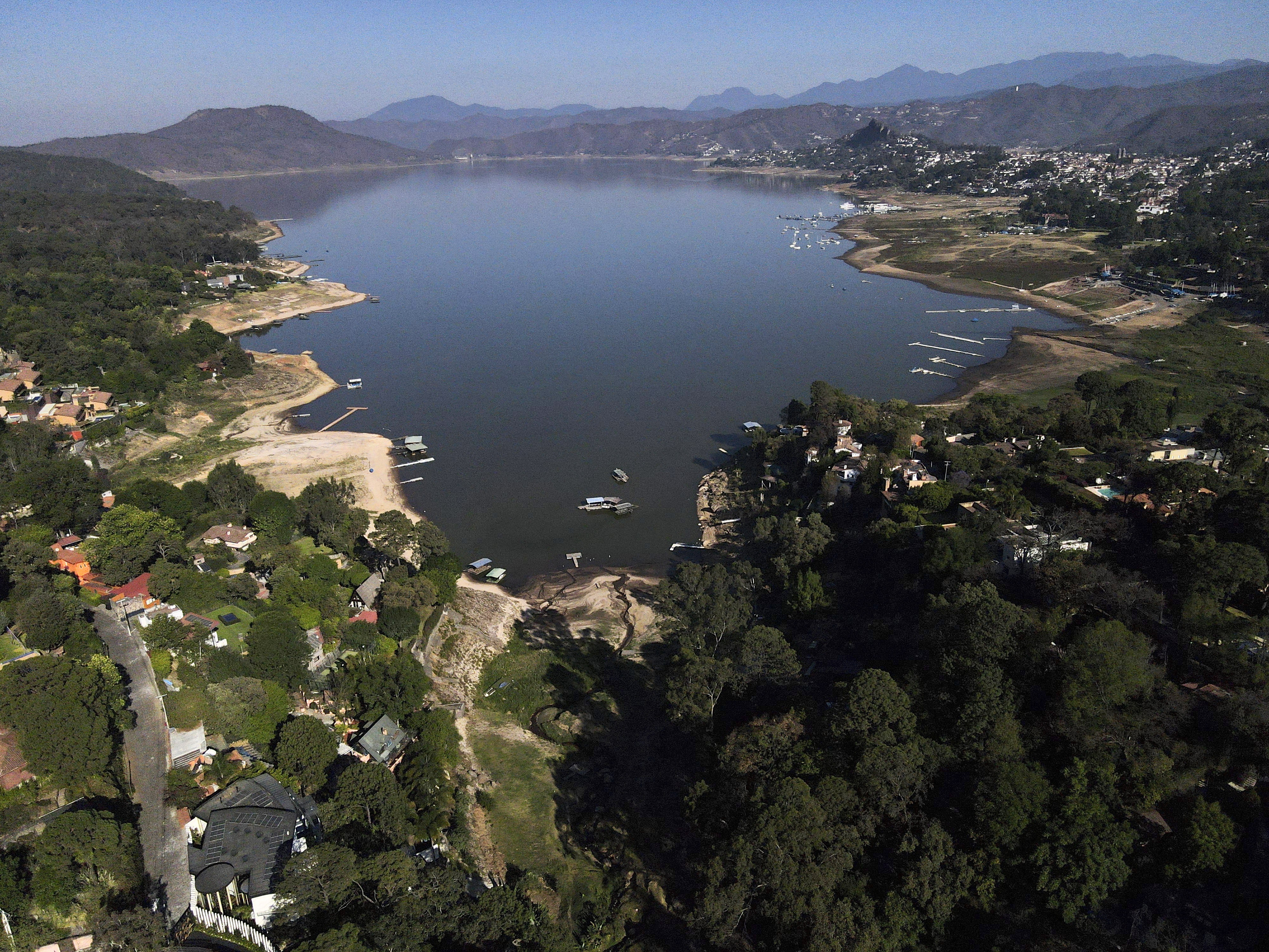 In Mexico, a once glittering lake is being sucked dry by development,  drought and lawlessness | AP News