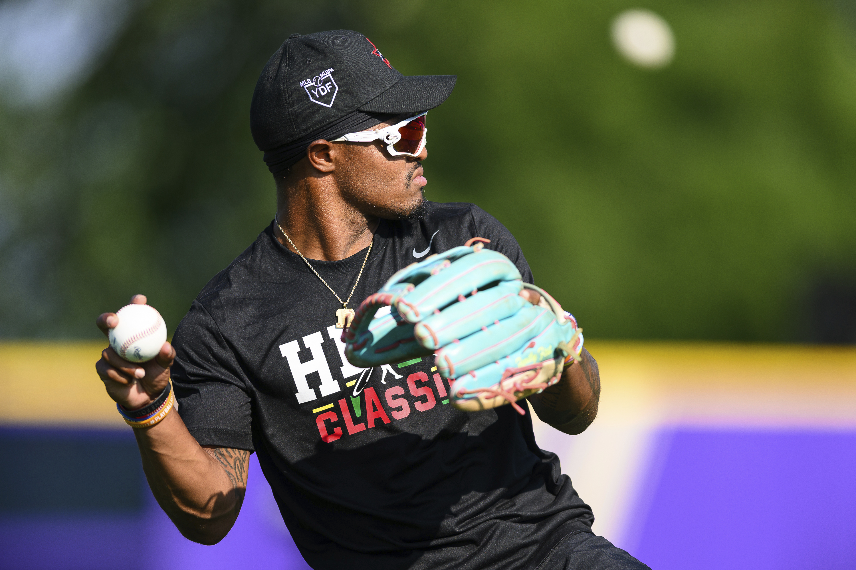 Why are MLB players wearing green hats today?