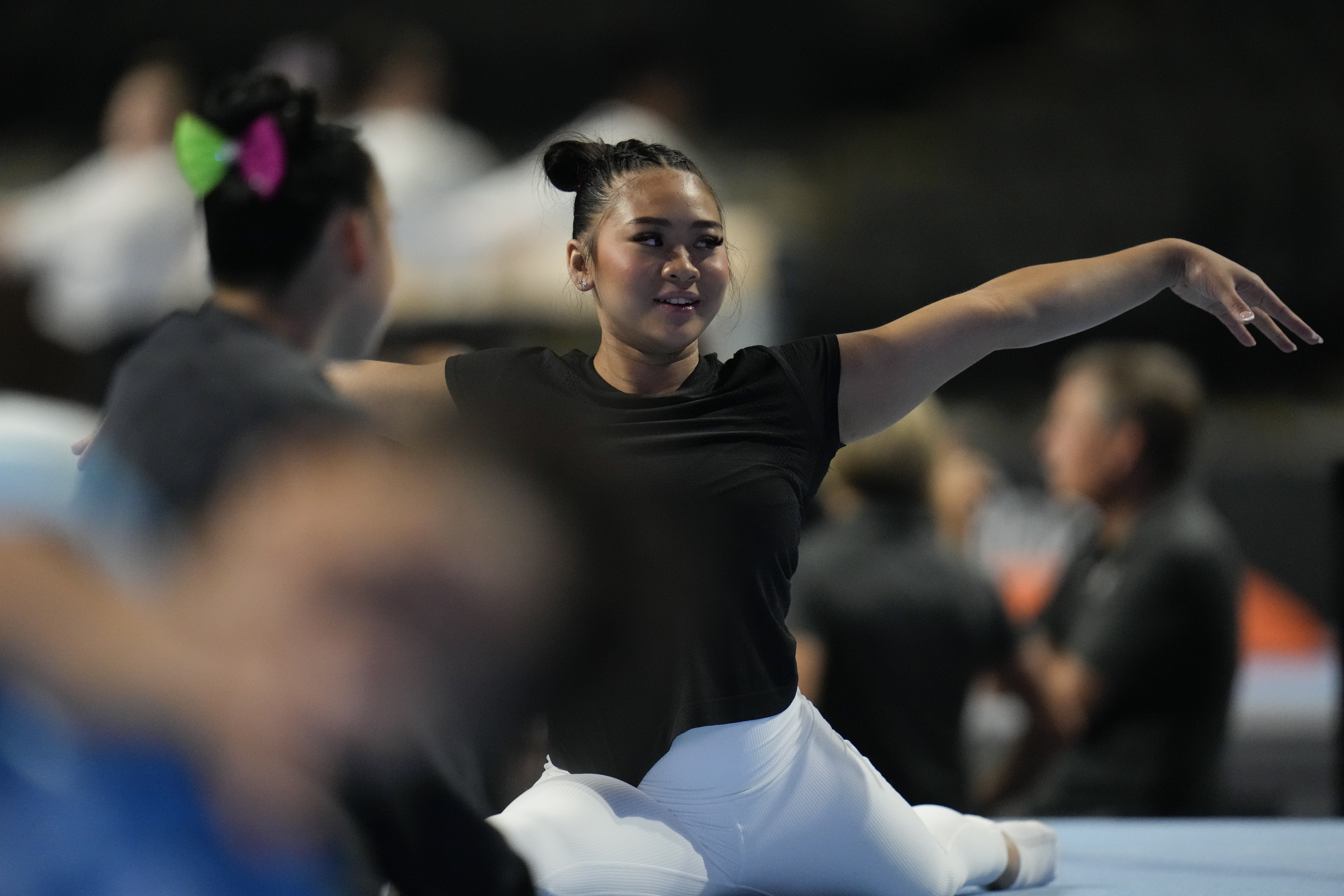 Olympic gymnastics champion Suni Lee began pointing to 2024