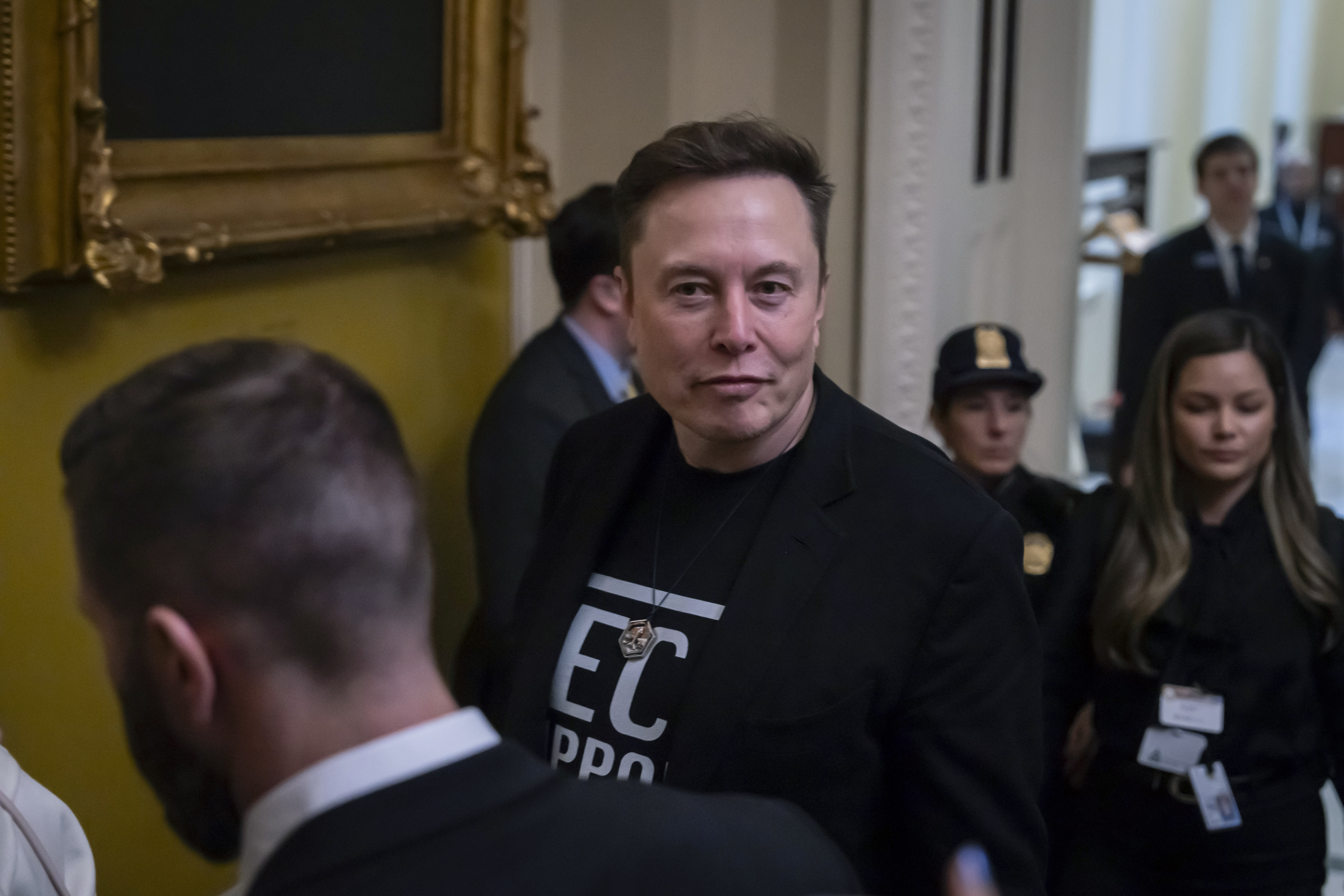 Elon Musk leaves after meeting with senate Republicans, at the Capitol in Washington, Wednesday, March 5, 2025.