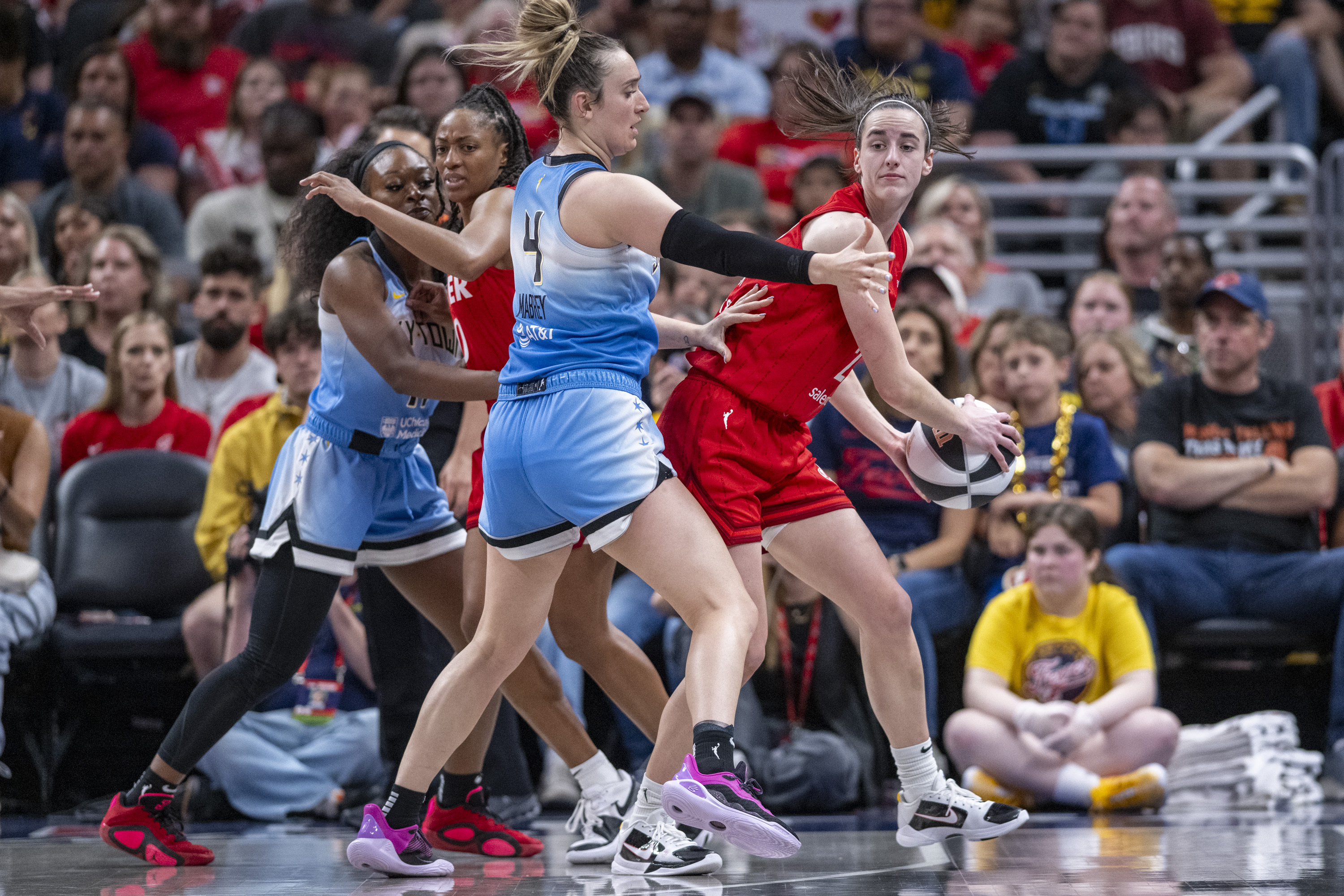 WNBA upgrades foul on Caitlin Clark by Chennedy Carter, fines Angel Reese  for no postgame interview | AP News