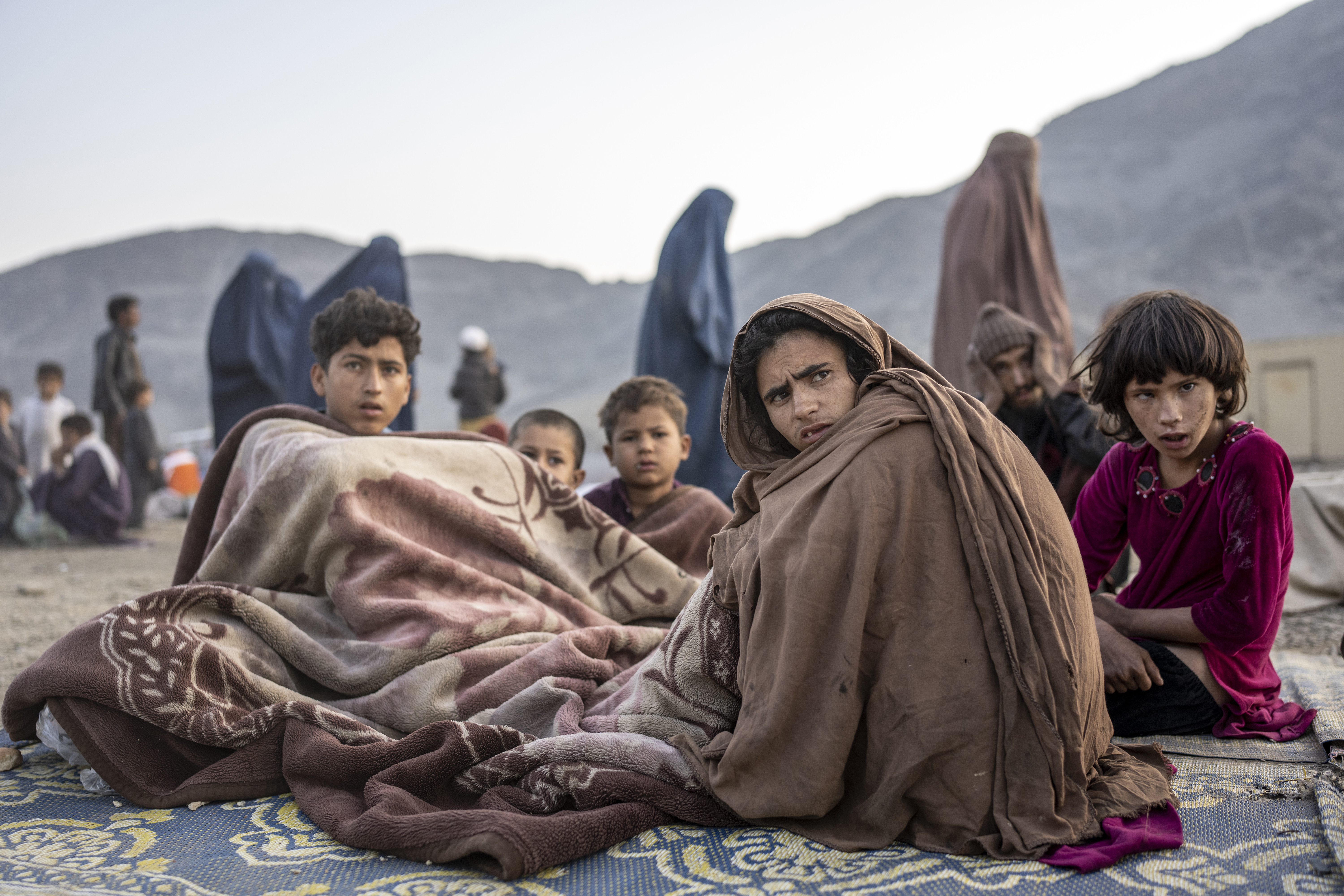 Afghans fleeing Pakistan lack water, food and shelter once they cross the  border, aid groups say | AP News