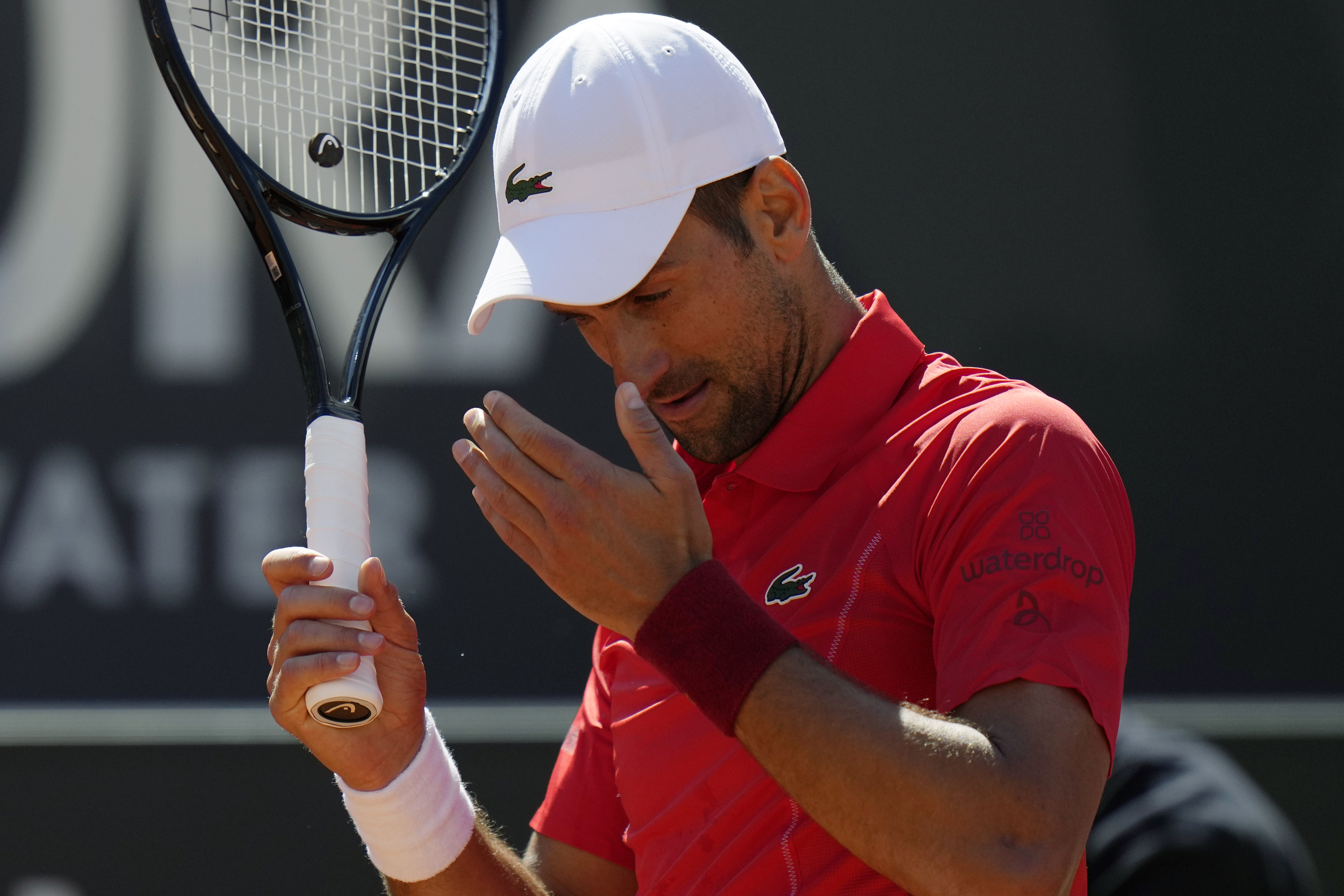 Djokovic follows Nadal to early exit at Italian Open in first match after  being hit by water bottle | AP News